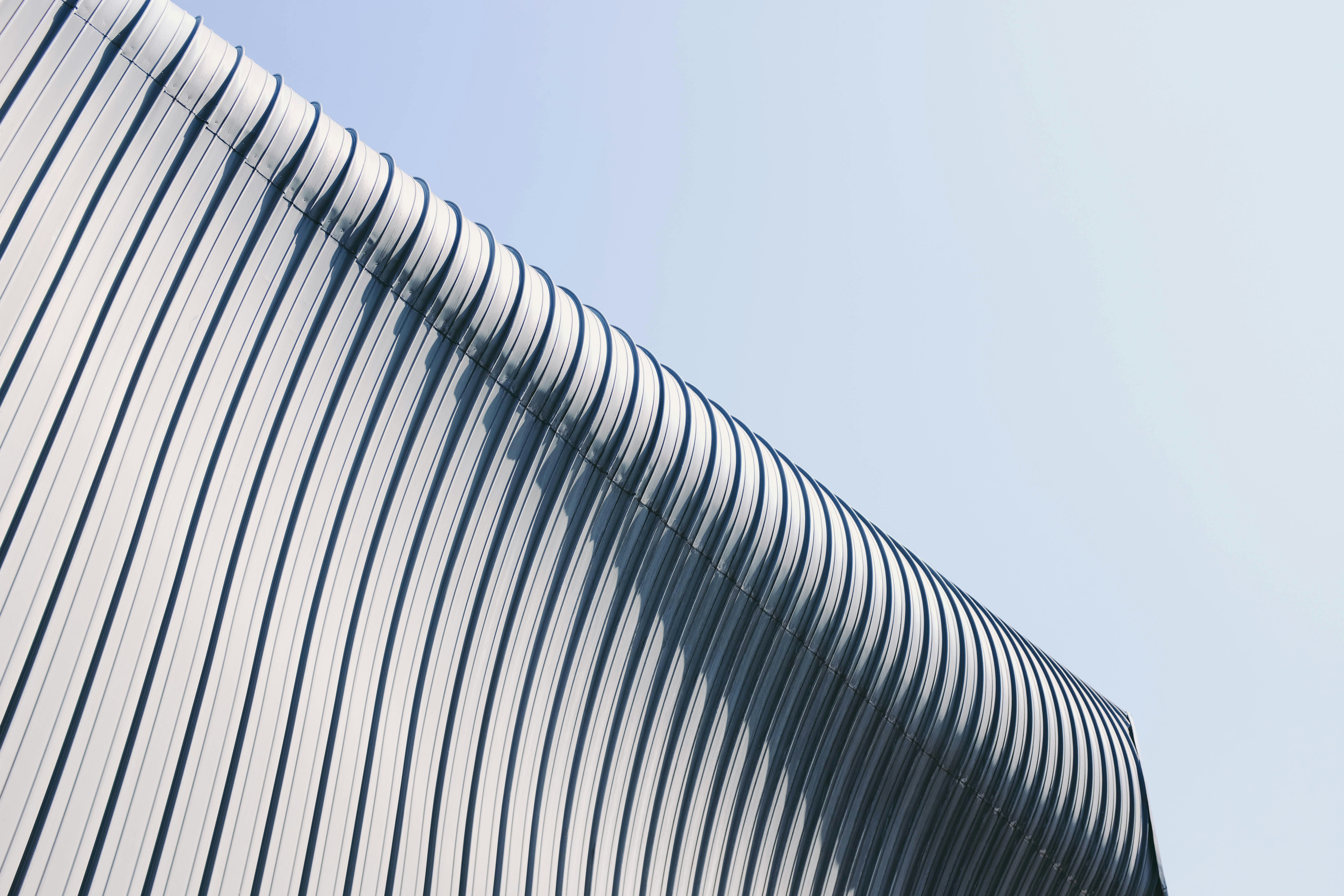 gray and white building roof at day time